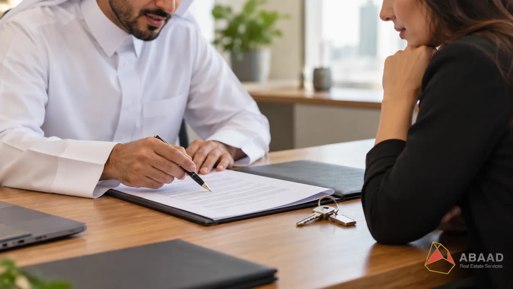 Illustrative scene of an advisor explaining rental terms to a prospective tenant.